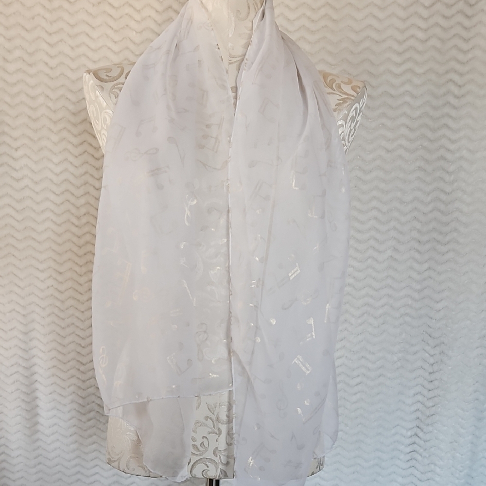 Elegant White Sheer Scarf with a gold musical note design.